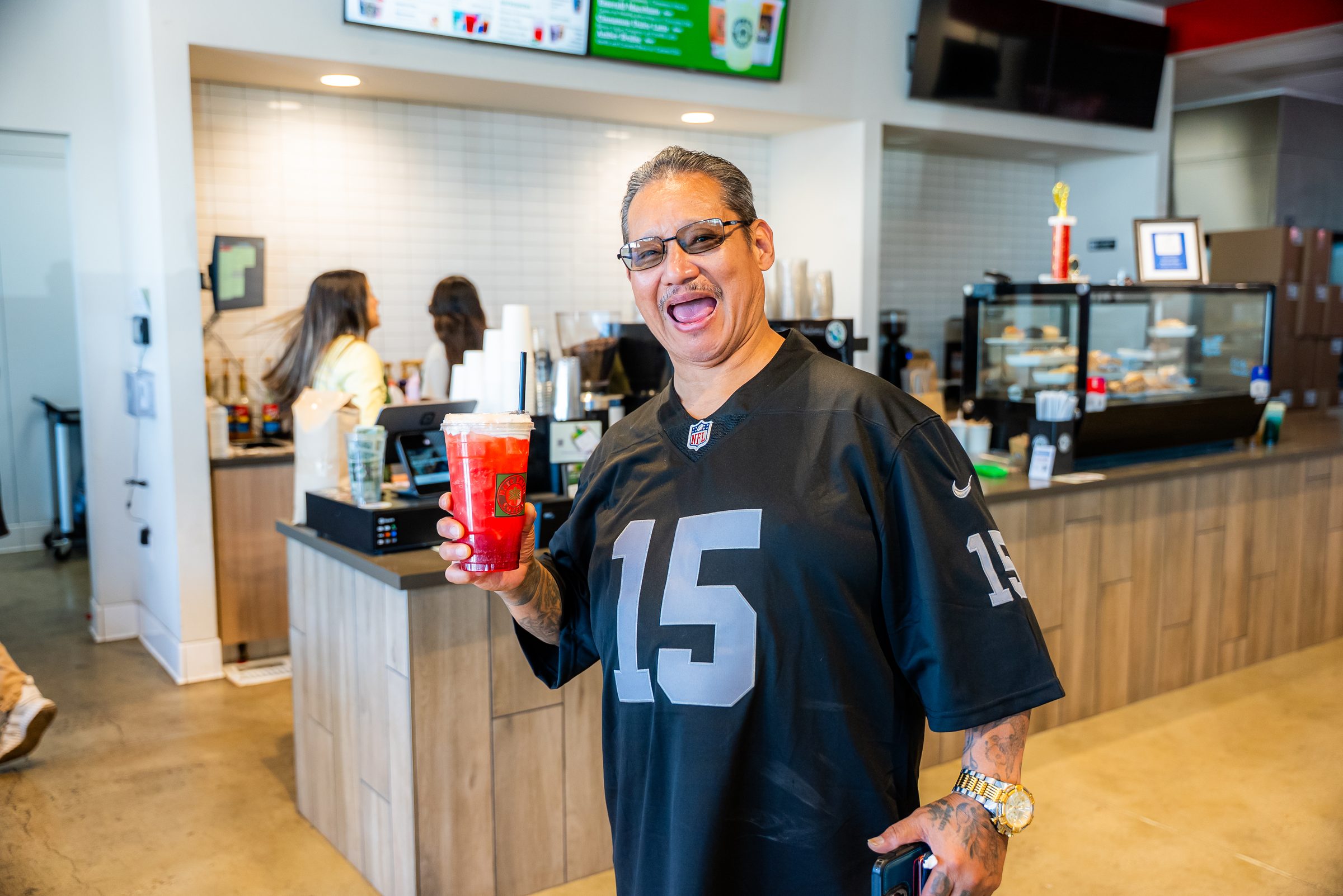 Happy customer at Rare Earth Coffee