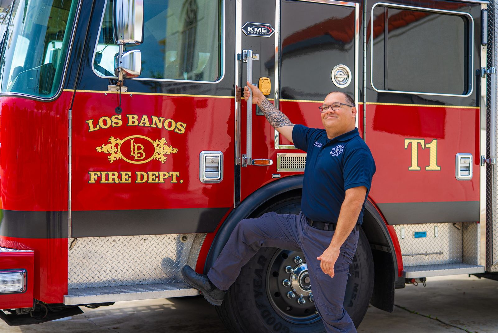 Fire chief on the truck step — American Red Cross