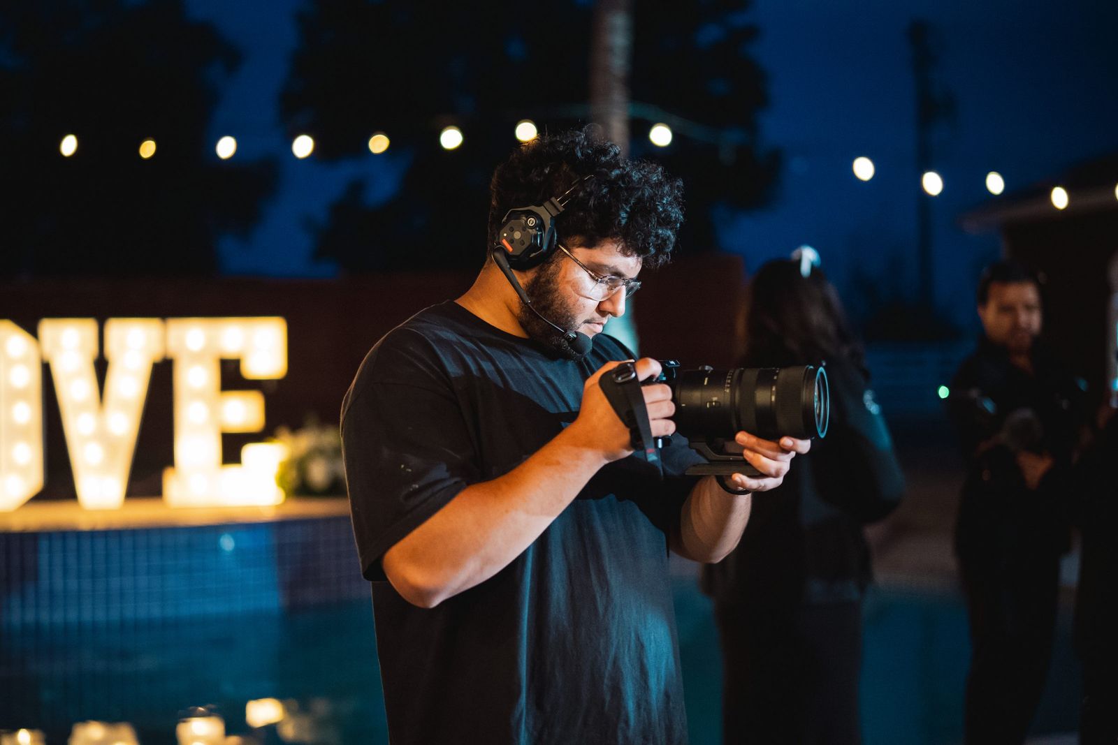 Videographer by the LOVE sign — Imagine Way More · Behind the Scenes