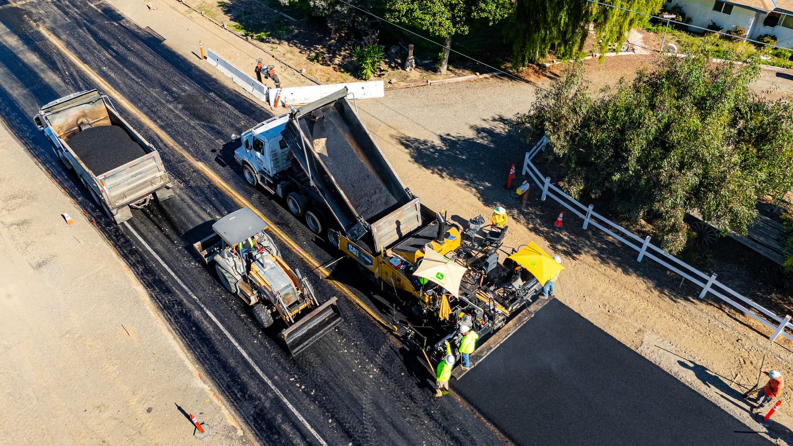 Paving train from above — City of Los Banos