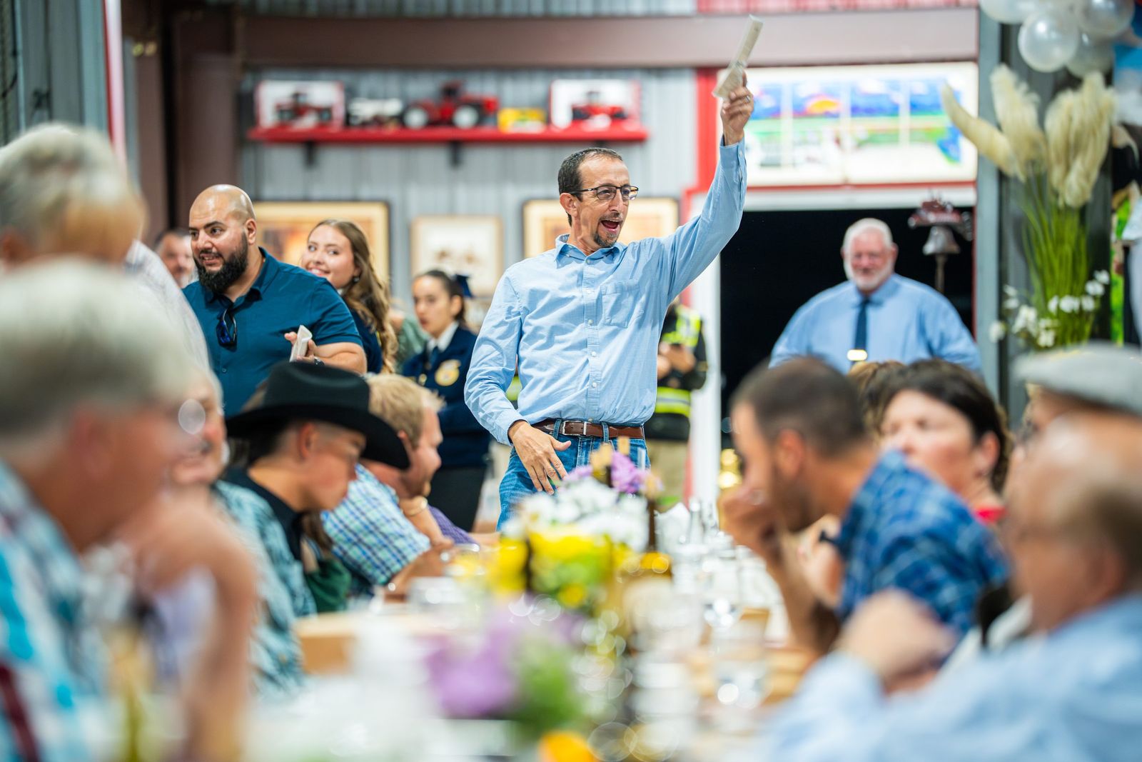 Bidding at the barn dinner — City of Los Banos