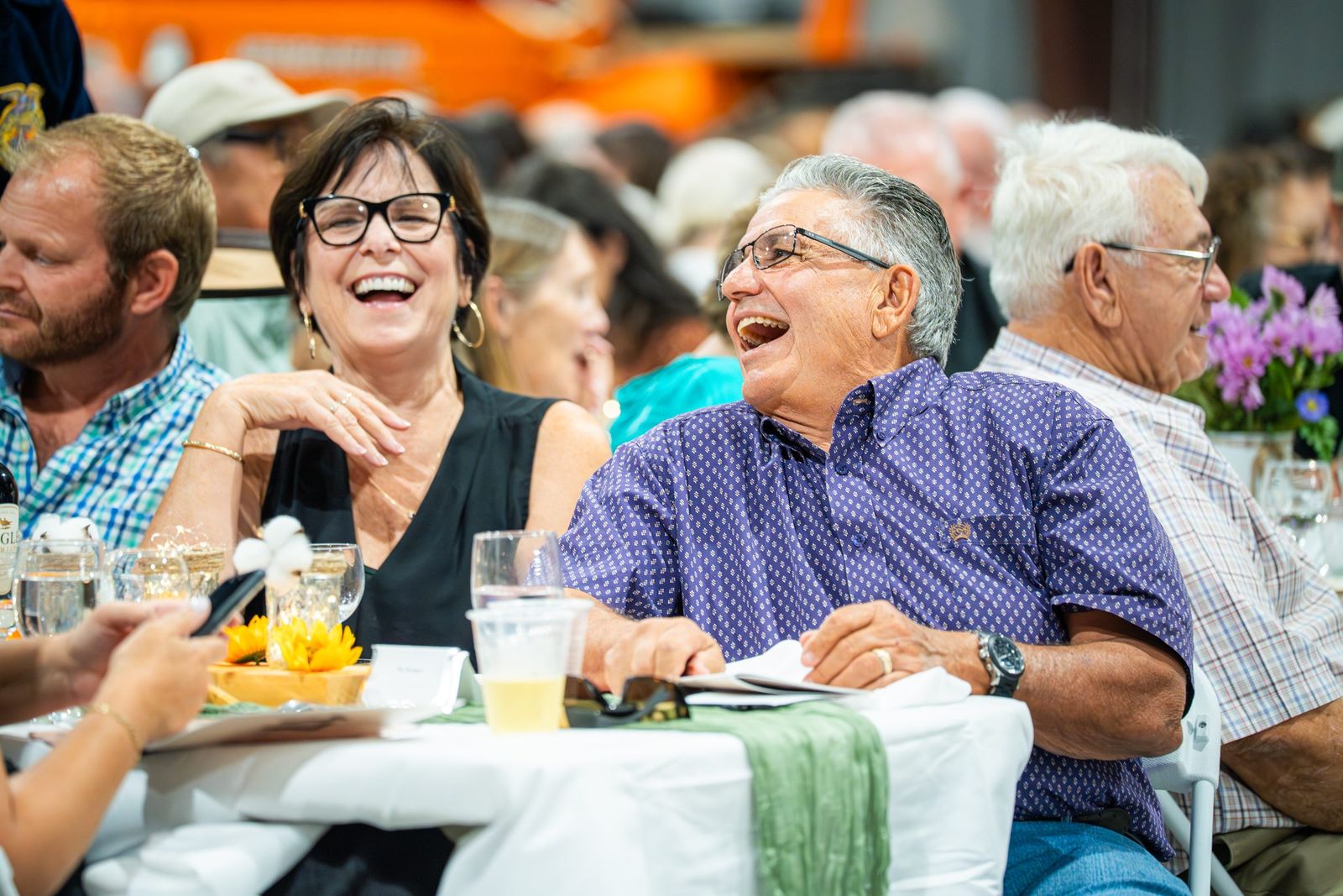 Laughter at the farm dinner — City of Los Banos