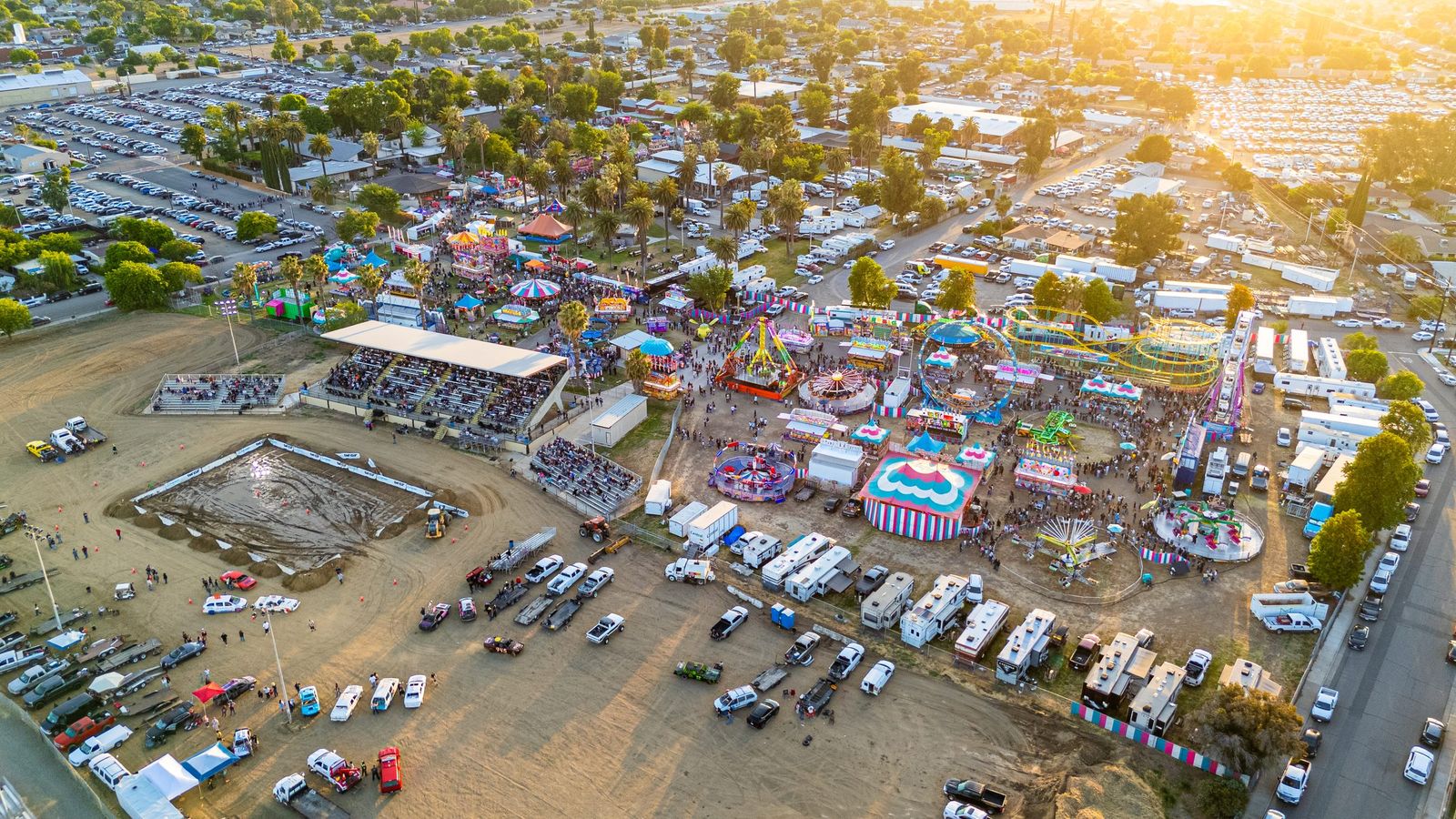 Fairgrounds carnival at golden hour — City of Los Banos