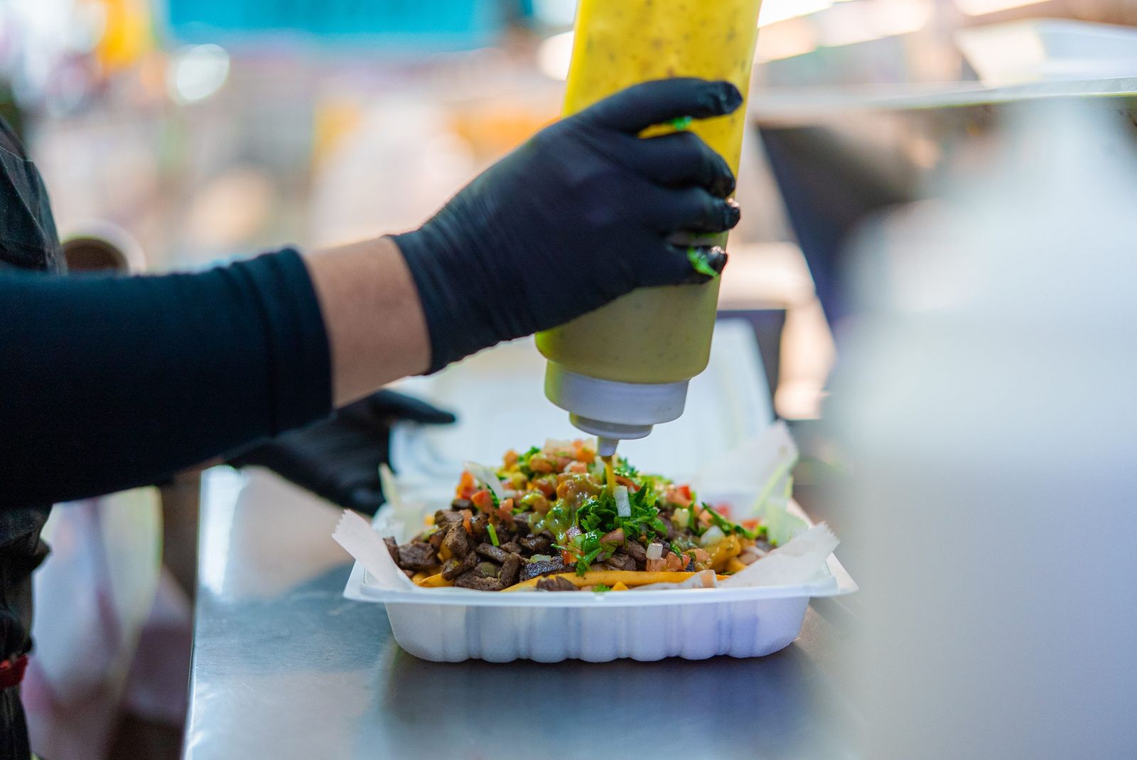 Sauce on carne asada fries — City of Los Banos