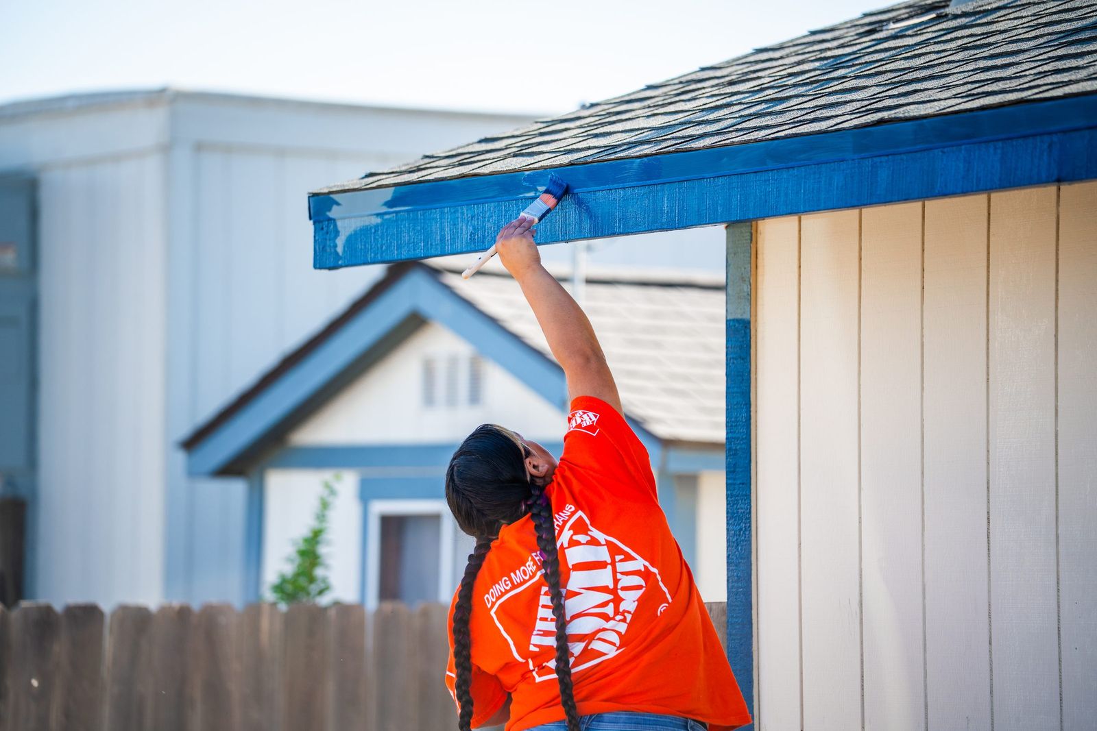 Painting the roof trim — City of Los Banos