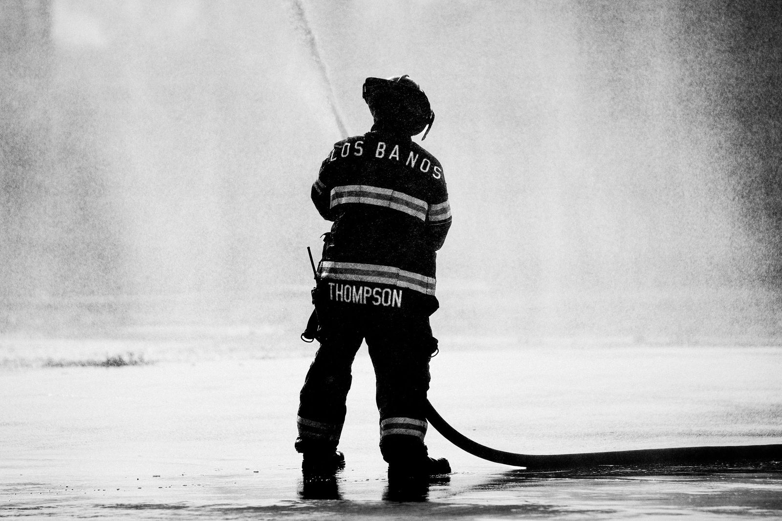 Silhouette in the spray — Los Banos Fire Department