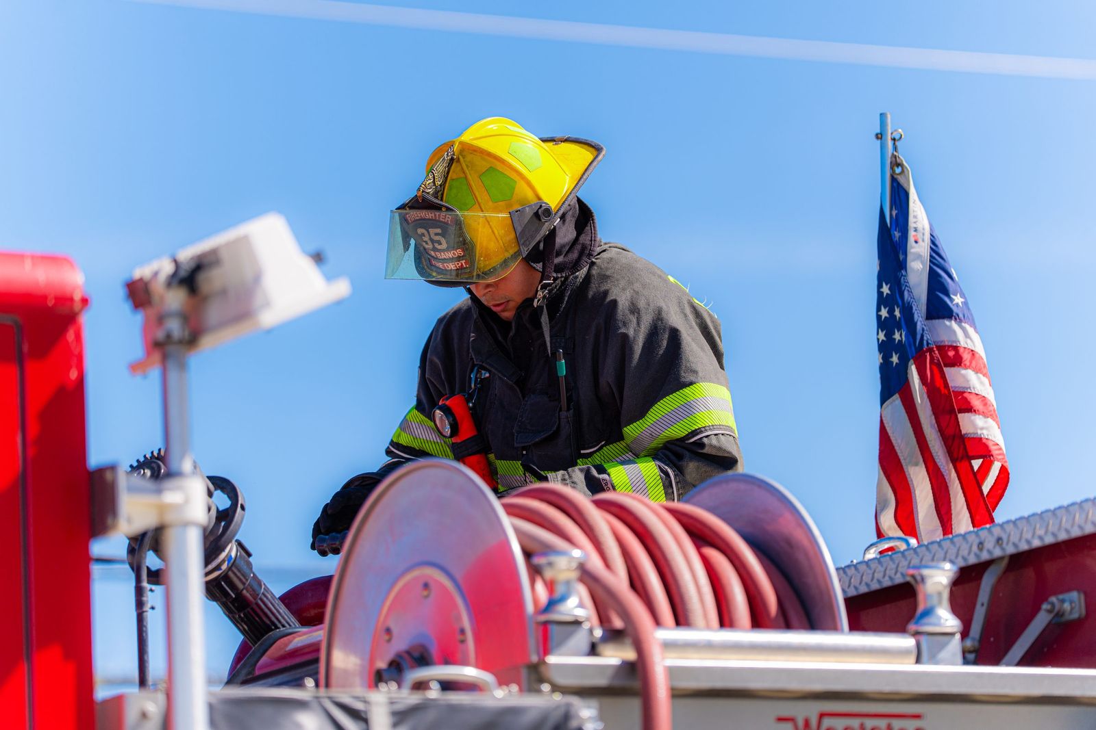 Hose reel and flag — Los Banos Fire Department