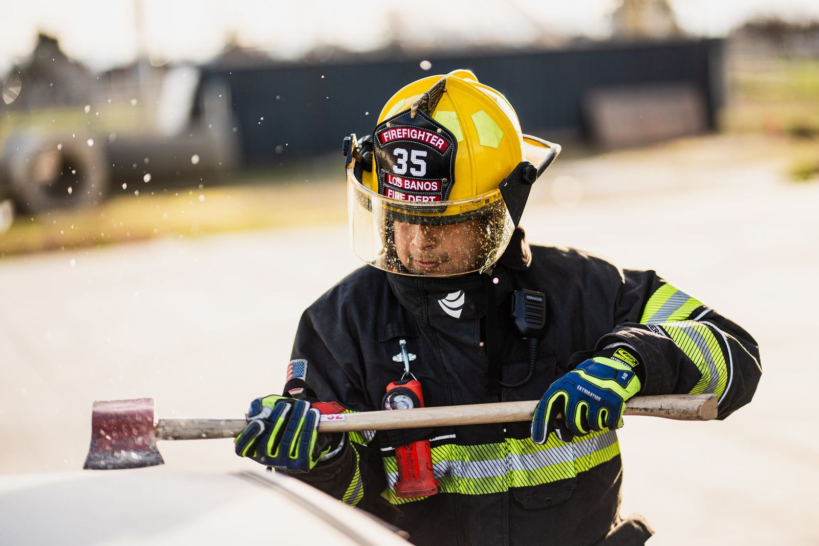 Axe and flying glass — Los Banos Fire Department