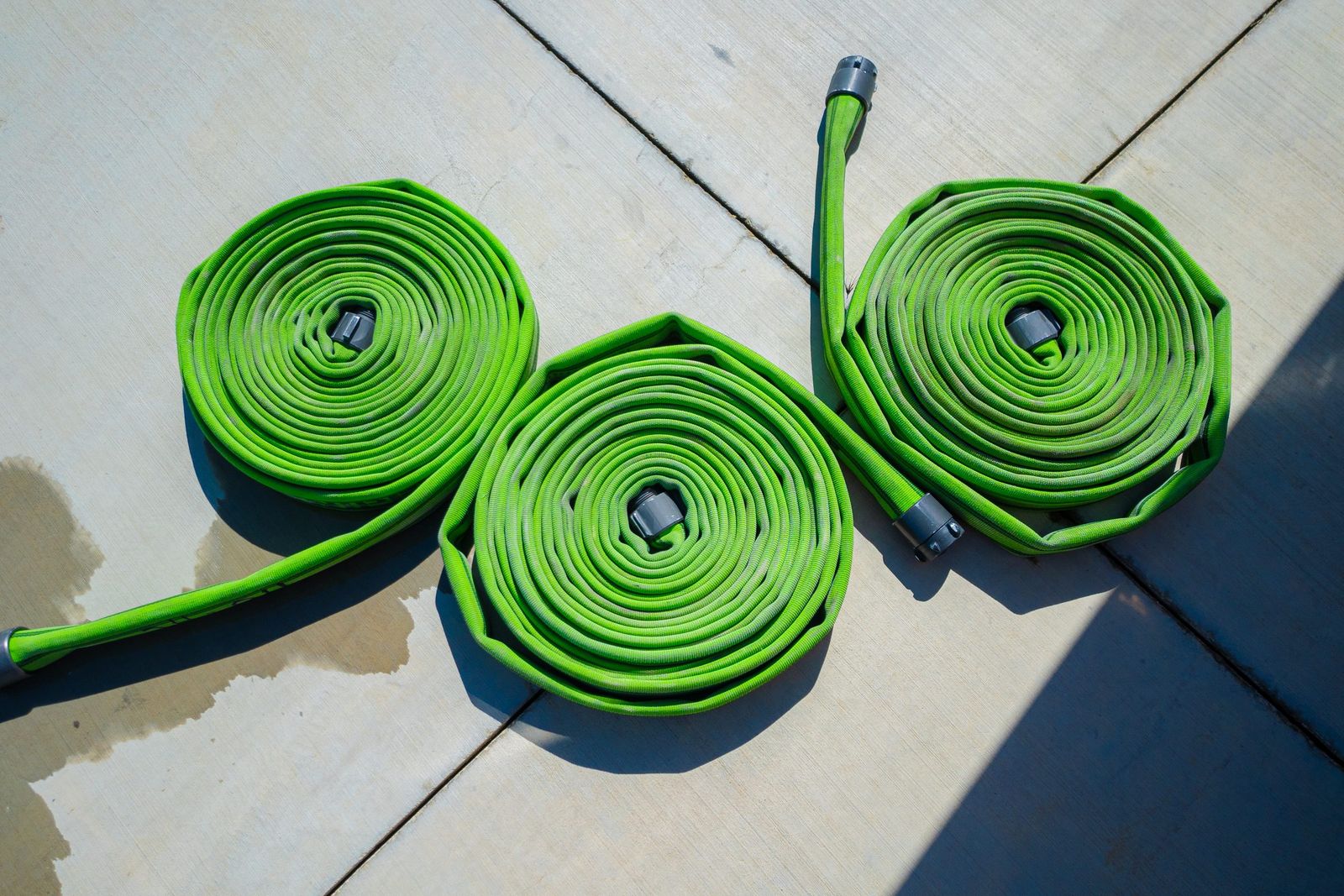 Hose rolls from above — Los Banos Fire Department