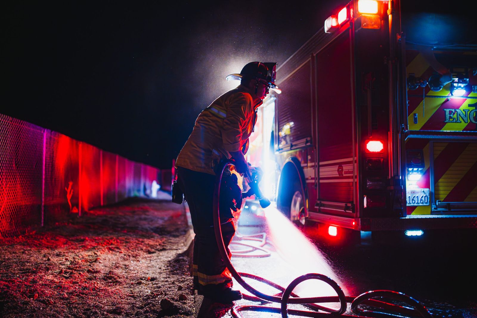 Hose line under engine lights — Los Banos Fire Department
