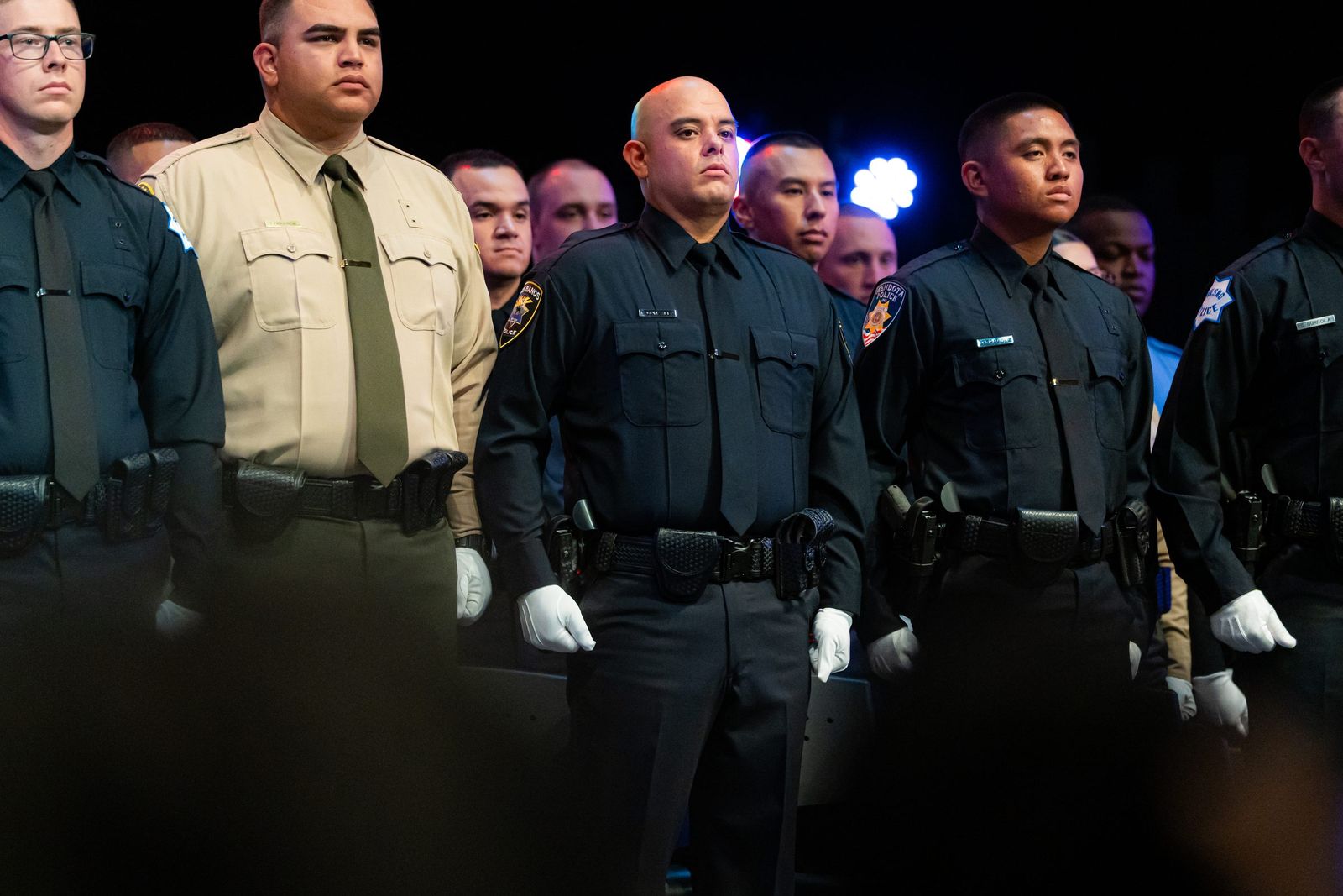 Academy graduates on stage — Los Banos Police Department