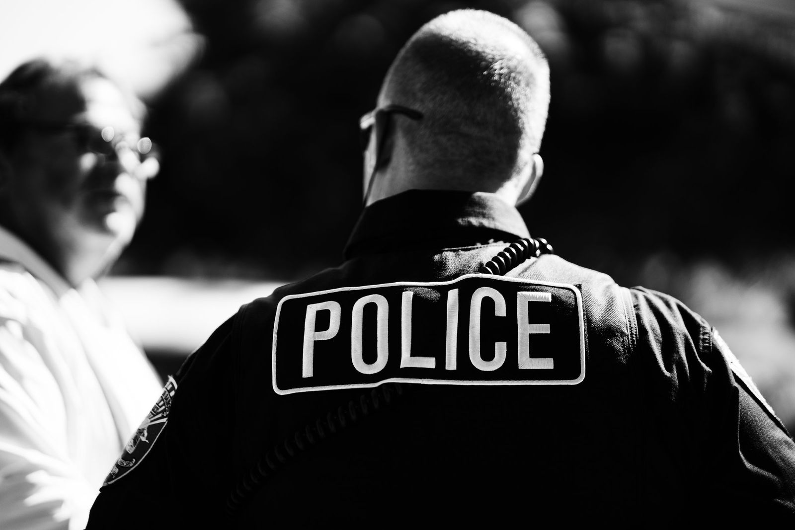 Police jacket in black and white — Los Banos Police Department
