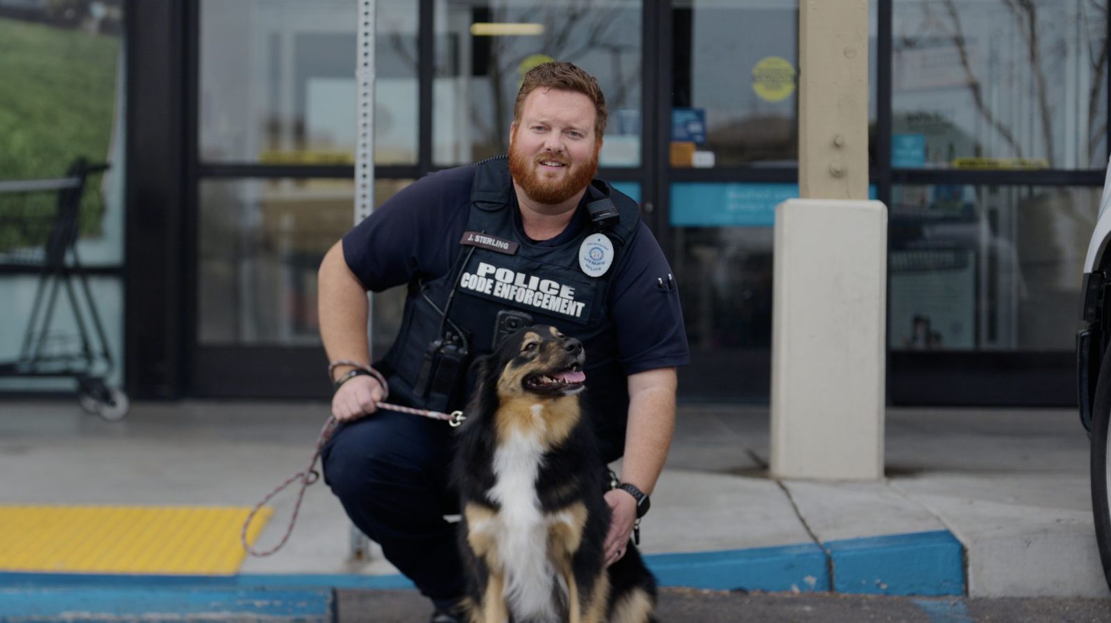 Code enforcement officer and adoptable dog — Los Banos Police Department