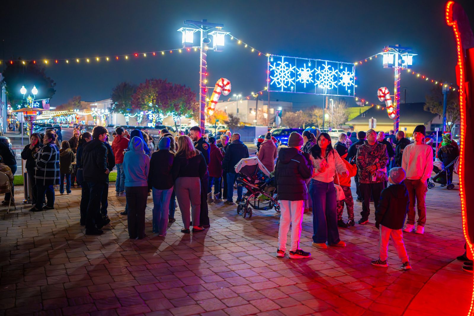 Families under holiday lights — Los Banos Police Department