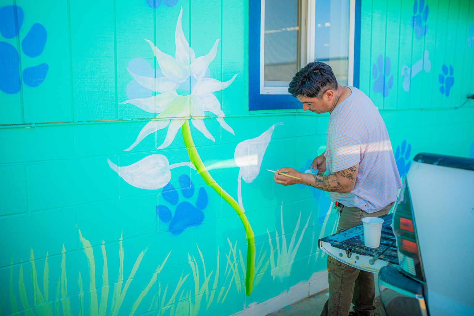 Painting a shelter mural — Los Banos Police Department