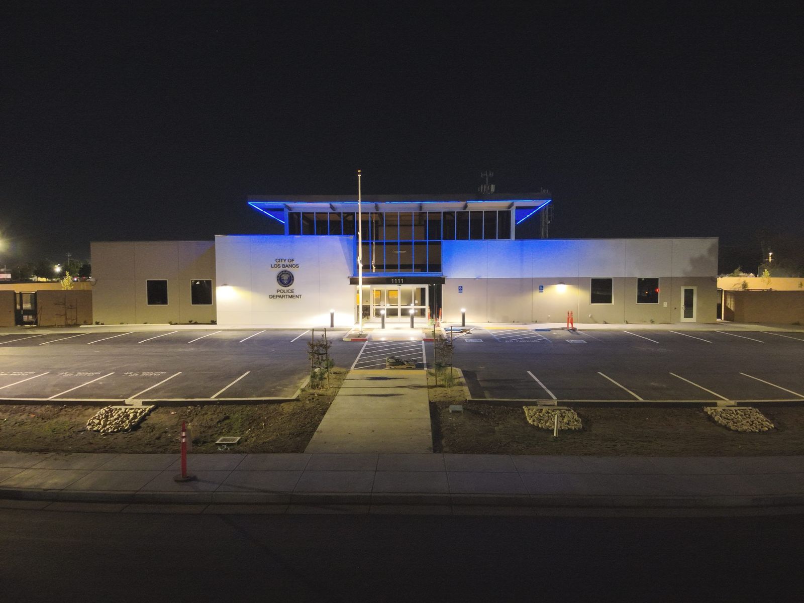 Police station at night — Los Banos Police Department