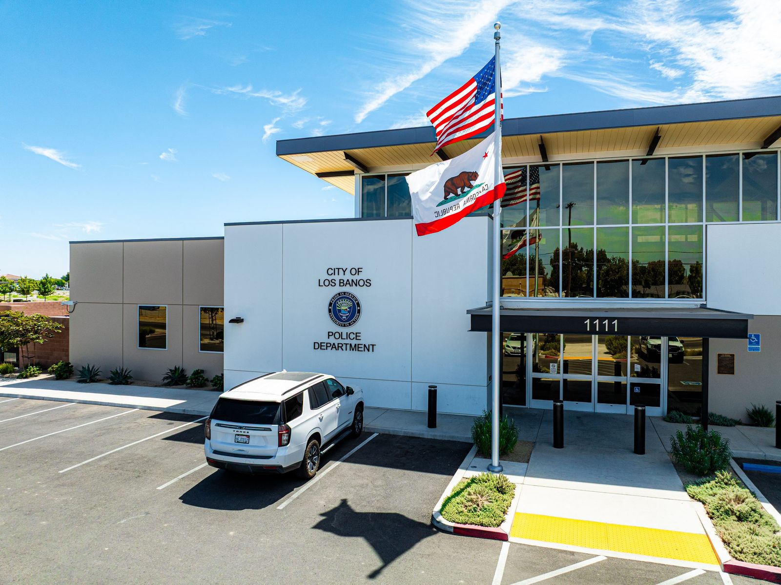 Headquarters under blue sky — Los Banos Police Department