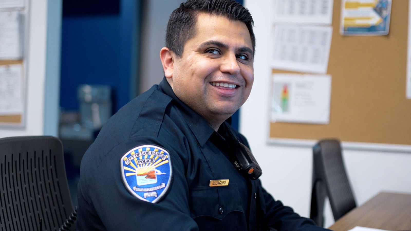 Officer at the station desk — Los Banos Police Department