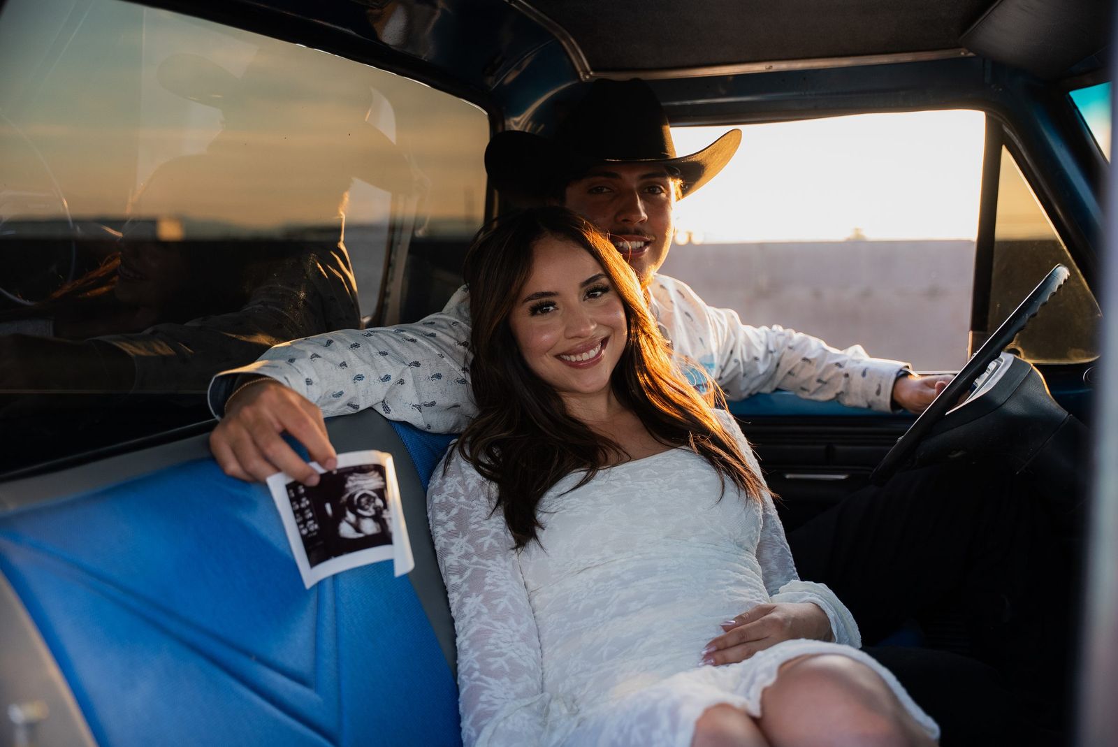 Expecting couple in the truck cab — Couples Session