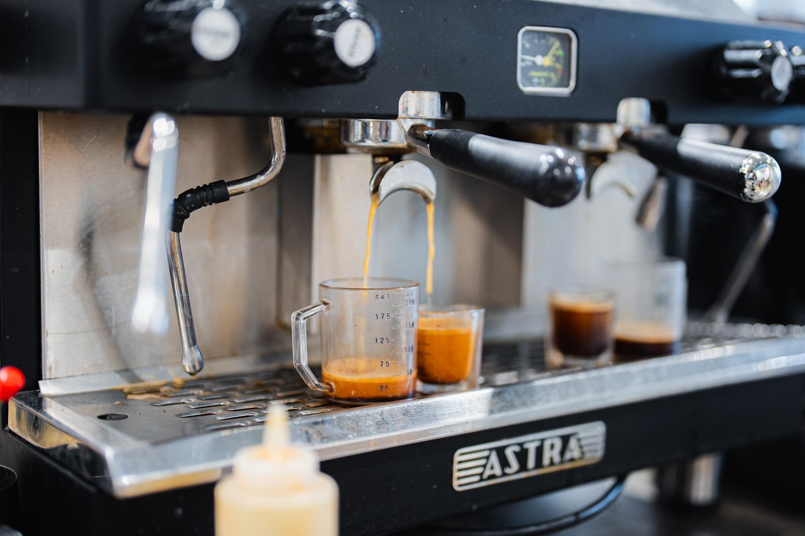 Espresso shots pouring at Rare Earth Coffee