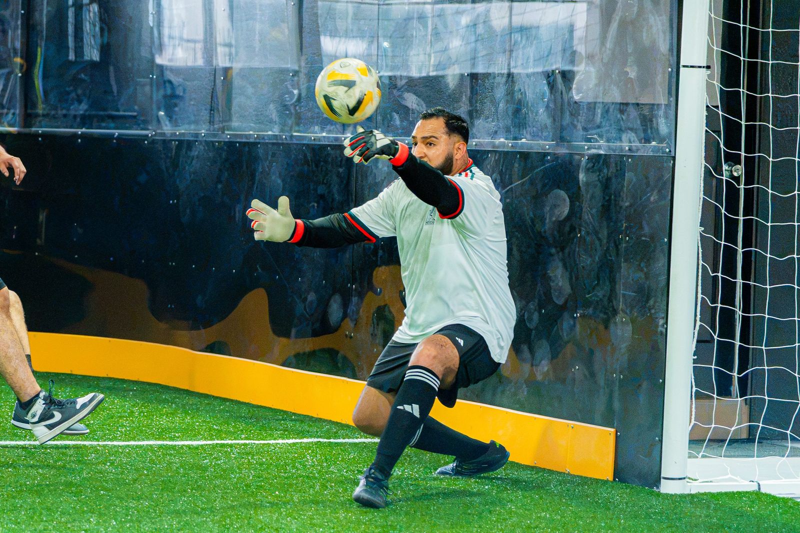 Goalkeeper reaching for the save — RR Indoor Complex