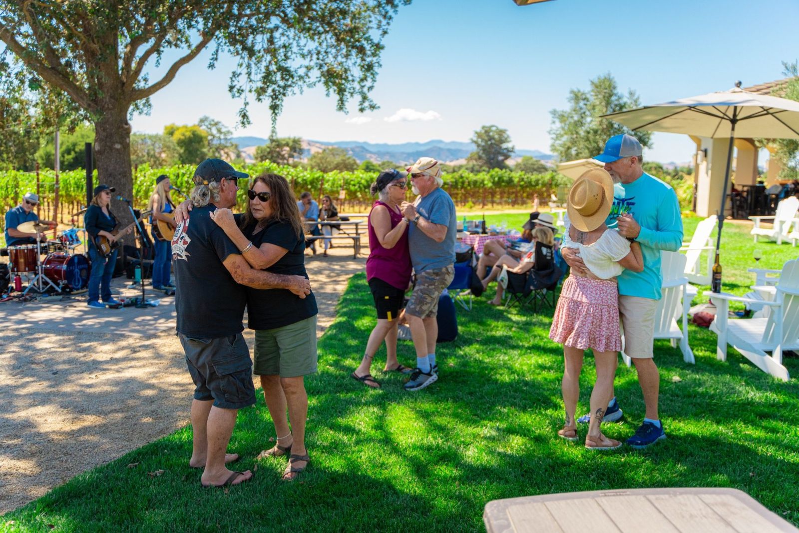 Dancing to live music on the lawn — Verde Vineyards